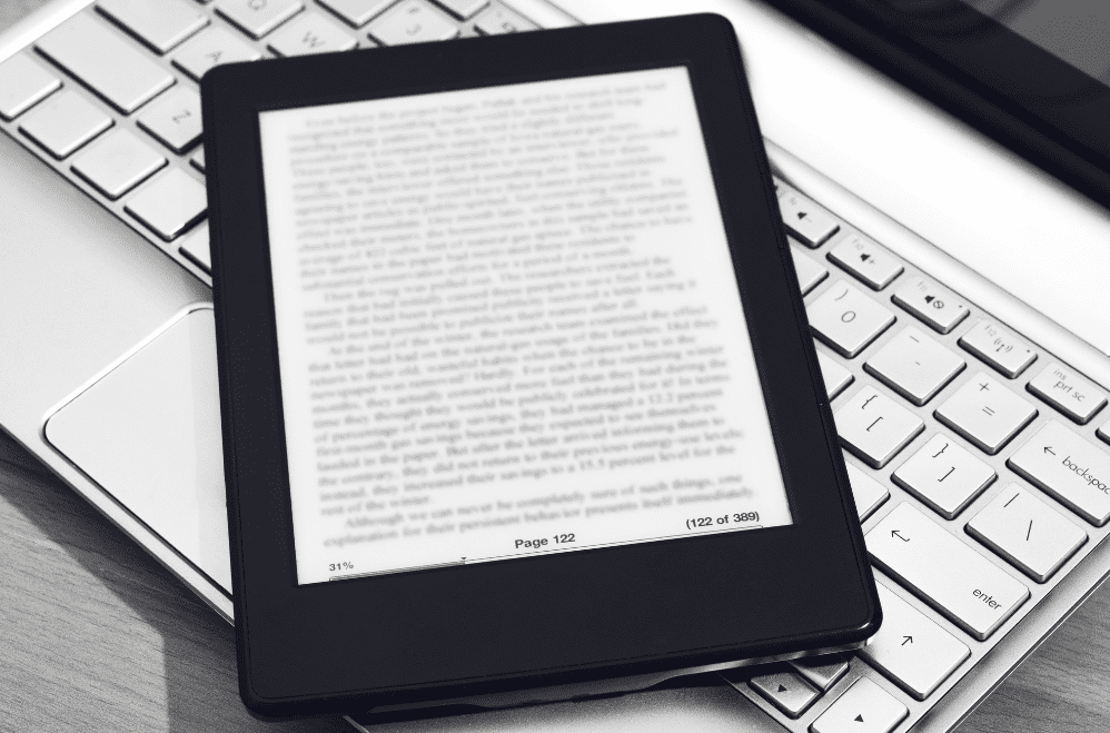 E-reader sitting on a keyboard